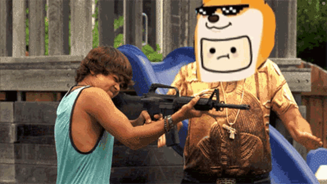 a man wearing sunglasses is holding a gun in front of another man