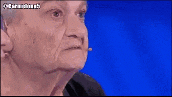 a close up of an older woman 's face with the hashtag carmelona5 on the bottom