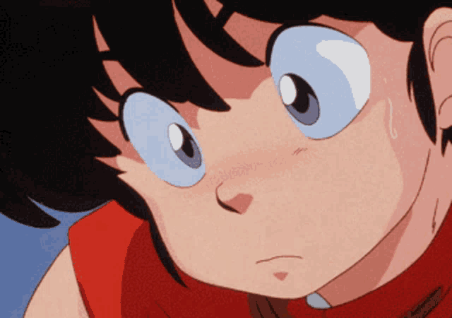 a close up of a cartoon character with a red shirt on