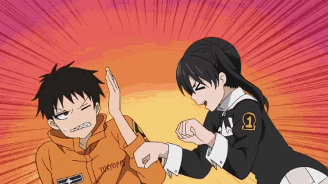a boy and a girl are fighting and the girl is wearing a tokyofb shirt