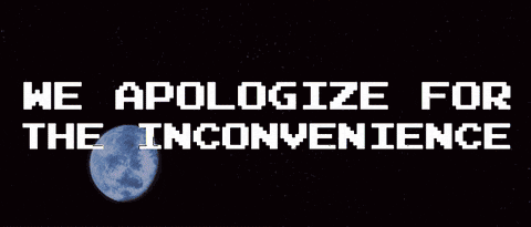 a sign that says we apologize for the inconvenience with a explosion in the background