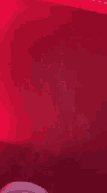 a red background with smoke coming out of the bottom