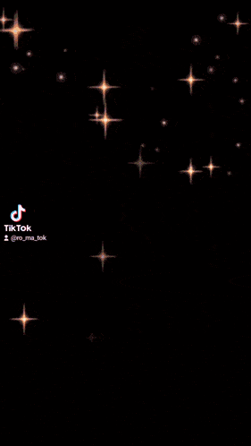 a tiktok video of a red flower with stars