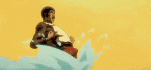 a man in a suit is floating on top of a wave in the ocean .