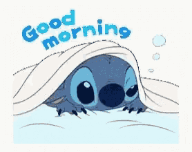 a sticker of stitch laying under a blanket with the words `` good morning '' .