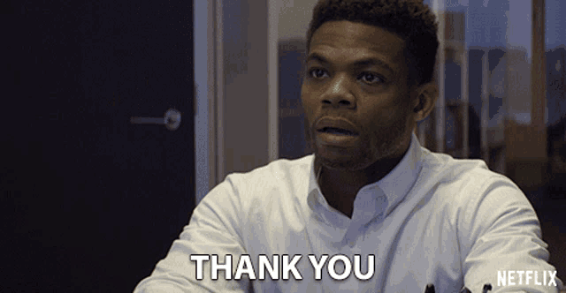 a man in a white shirt says thank you in a netflix ad