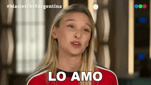 a blonde woman is making a funny face and says lo amo