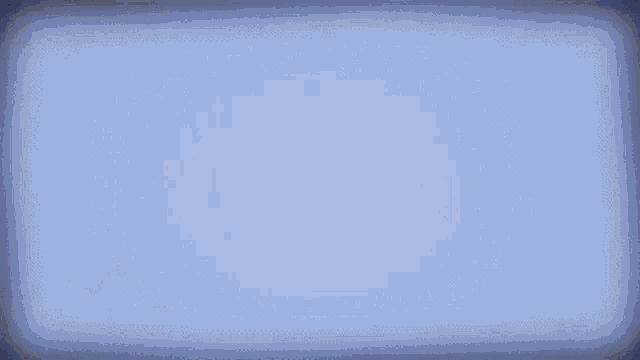 a group of dolphins are swimming in the ocean and flying through the air .