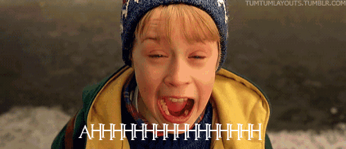 a young boy with his mouth open and the words ahhhh on the bottom right