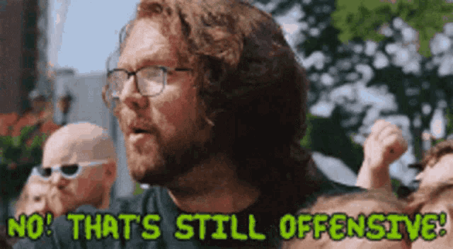 a man wearing glasses says no that 's still offensive