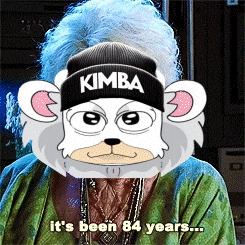 a cartoon monkey wearing a kimba hat
