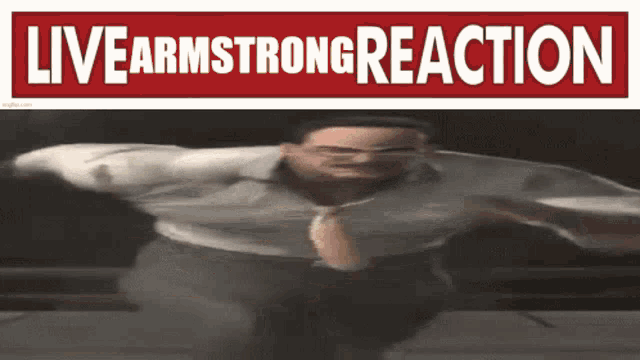 a man is jumping in the air next to a sign that says livearmstrongreaction