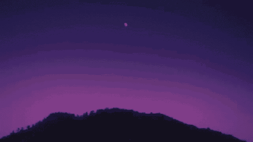 a purple sky with a mountain in the foreground and the moon in the background
