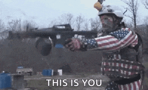 a man in an american flag shirt is holding a gun and says `` this is you '' .