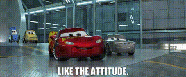 a group of cars are driving in a garage with the words `` like the attitude '' written on the bottom .