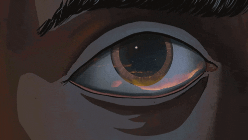 a close up of a person 's eye with a reflection of the moon