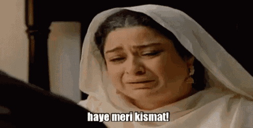 a woman with a veil on her head is crying and says `` haye meri kismat '' .