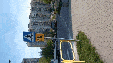 a street with a sign that says ' bicycles ' on it