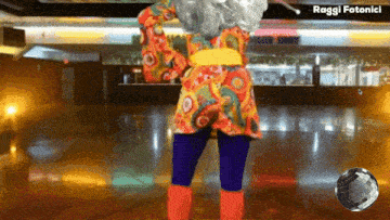 a woman in a colorful dress is dancing in front of a sign that says raggi fotonici