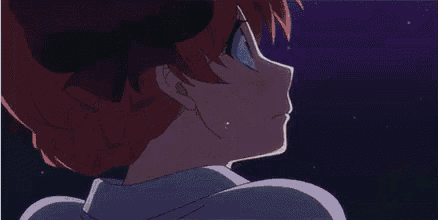 a close up of a person 's face with the words `` your waifu is shit '' written above them .