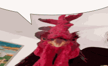 a close up of a red rooster with a very long neck
