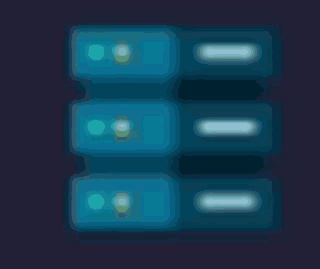 a blurred image of three blue boxes with green and yellow lights on them .