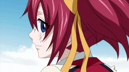 a girl with red hair and a yellow ribbon around her neck
