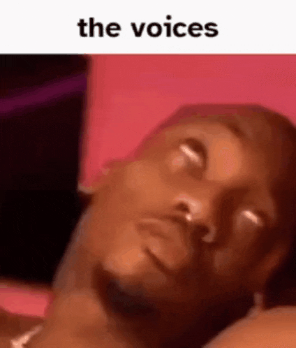 a man is laying on a bed with his eyes closed and the words `` the voices '' written above him .
