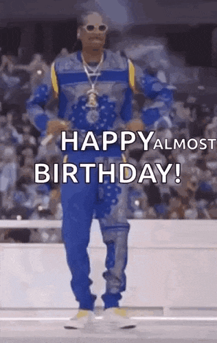 snoop dogg is dancing in front of a crowd and saying `` happy almost birthday ! ''