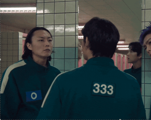 a man with the number 333 on the back of his shirt