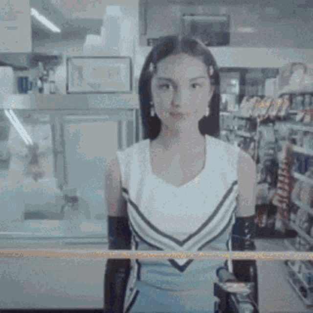 a blurry picture of a person standing in front of a window