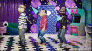 a group of cartoon characters are dancing in a room with an arcade machine in the background