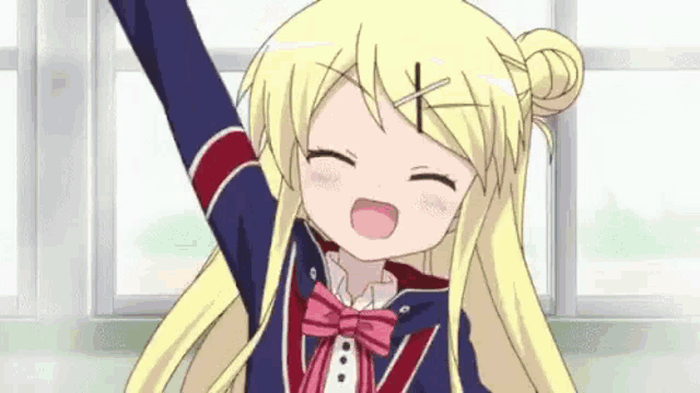 a girl with blonde hair is raising her arms in the air .