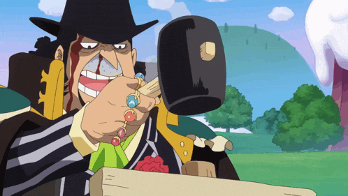 a man in a cowboy hat is holding a hammer in his hand