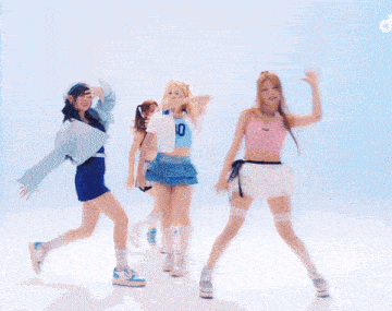 a girl in a pink crop top with the letter p on the bottom of it