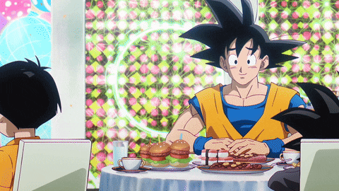 a cartoon character sitting at a table with a plate of food on it