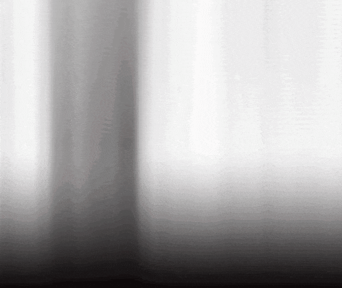 a black and white photo of a stainless steel surface