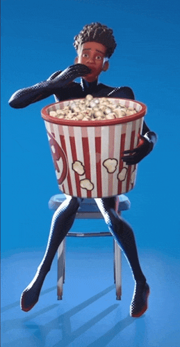 a cartoon character is sitting on a chair holding a striped bucket of popcorn
