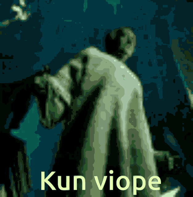 a blurred image of a man with the words kun viope on the bottom