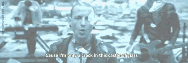 a man singing a song with the words cause i 'm only a crack in this castle of glass on the bottom