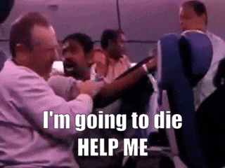 a man sitting on a plane with the words i 'm going to die help me