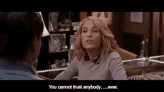 a woman is talking to a man and says " you cannot trust anybody "