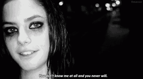 a black and white photo of a woman with a quote on her face