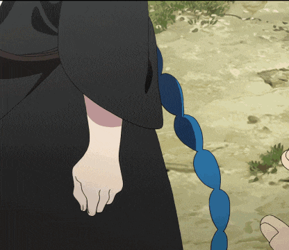 a person 's arm is shown with a blue string hanging from it