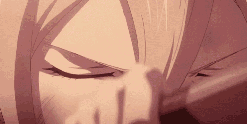 a close up of a person 's face with their eyes closed and a sword in the foreground .