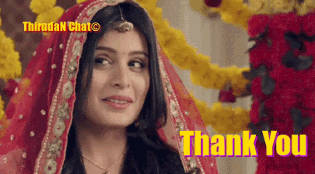 a woman in a wedding dress is smiling and saying thank you