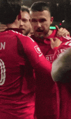 a soccer player with the number 18 on his jersey
