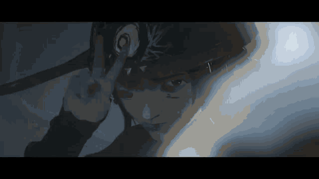 a close up of a person giving the peace sign