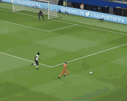 a soccer game is being played in front of a sign that says easports fifa