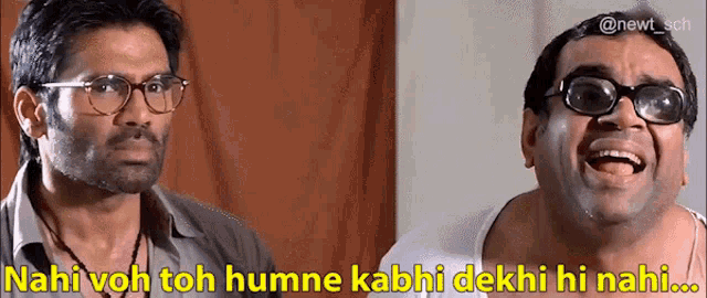 two men wearing glasses are standing next to each other with a caption that says nahi voh toh humne